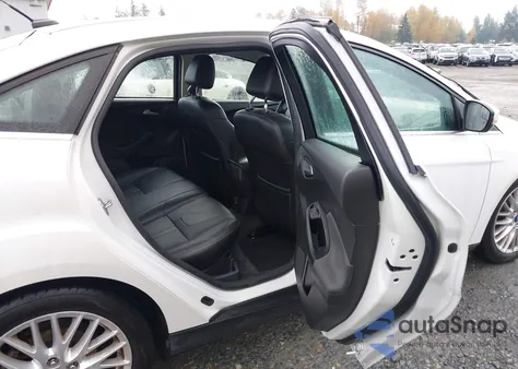 2012 Ford Focus Sel z USA, uszkodzony, nr VIN 1FAHP3H23CL285405